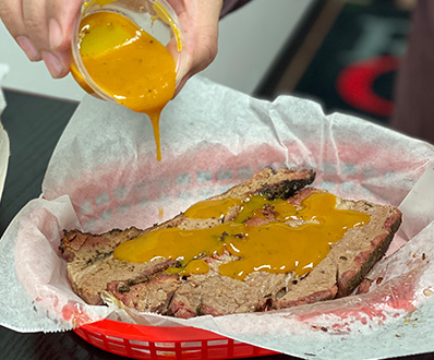 brisket with sauce topping